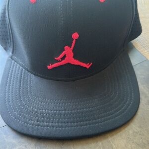 Jordan Black Snapback Hat with Red Jumpman Logo
